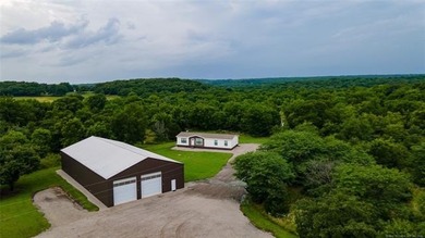 Move-in ready home with an incredible 50'x100' insulated shop on - photo 1