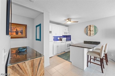 Enjoy breathtaking panoramic beach and bay views from this cozy - photo 3