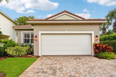 Lake Home For Sale in Palm Beach Gardens, Florida