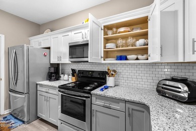 This beautifully updated 2-bedroom, 2-bath brick townhome is - photo 11
