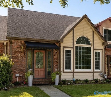 Beautiful townhome with loads of updates! Spacious living room - photo 1