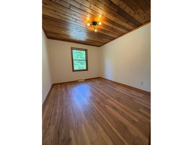Nestled among mature trees on over an acre of peaceful land - photo 15