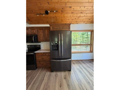 Nestled among mature trees on over an acre of peaceful land - photo 29