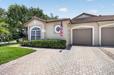 Located in the desirable Mizner Pointe community, this - photo 1