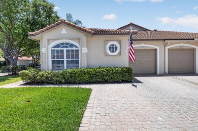 Located in the desirable Mizner Pointe community, this - photo 2