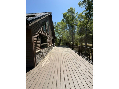 Nestled among mature trees on over an acre of peaceful land - photo 36