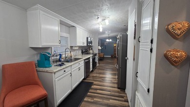 The current lot rent will increase for new buyer - please verify - photo 22