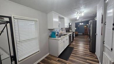 The current lot rent will increase for new buyer - please verify - photo 23
