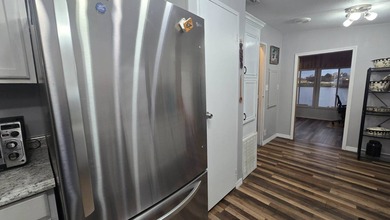 The current lot rent will increase for new buyer - please verify - photo 25