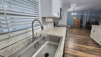 The current lot rent will increase for new buyer - please verify - photo 26