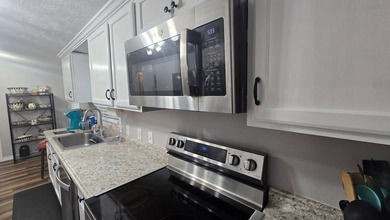 The current lot rent will increase for new buyer - please verify - photo 27