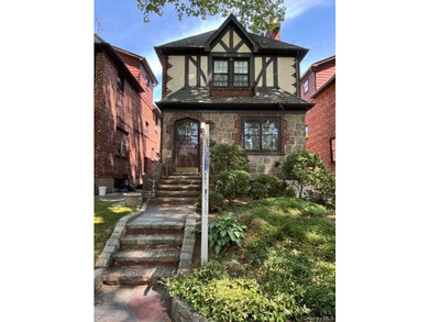 Welcome to this beautiful, detached Tudor styled home situated - photo 1