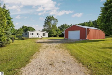 (private lake, pond, creek) Home For Sale in Benzonia Michigan
