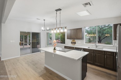 This better-than-new beauty nestled in the desired Country Club