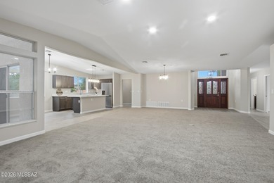 This better-than-new beauty nestled in the desired Country Club