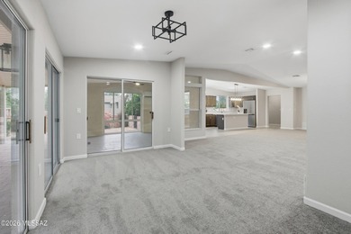 This better-than-new beauty nestled in the desired Country Club