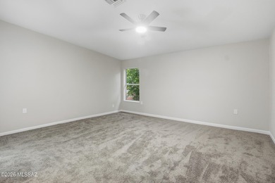 This better-than-new beauty nestled in the desired Country Club