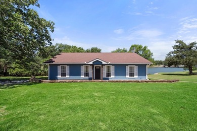 Welcome to your lakeside retreat in Rustling Oaks Estates on - photo 1