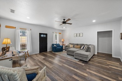 Welcome to your lakeside retreat in Rustling Oaks Estates on - photo 4