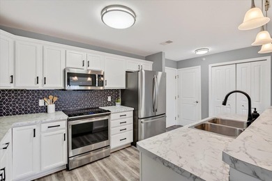 Welcome to easy living at a quiet condo community in the heart - photo 6