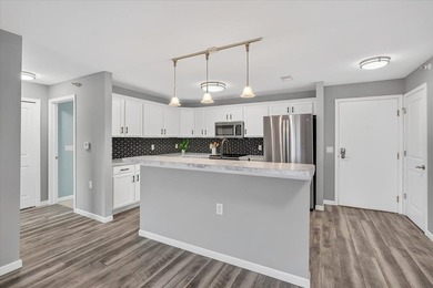 Welcome to easy living at a quiet condo community in the heart - photo 7