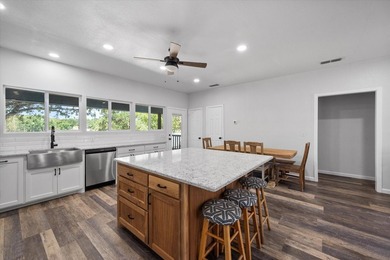 Welcome to your lakeside retreat in Rustling Oaks Estates on - photo 8