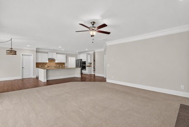 Situated on a generously sized golf course lot in Mount Vintage - photo 3
