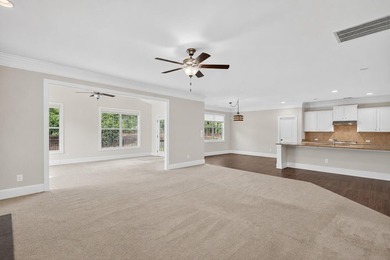 Situated on a generously sized golf course lot in Mount Vintage - photo 4