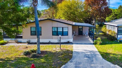 This newly remodeled manufactured home is located in the - photo 2