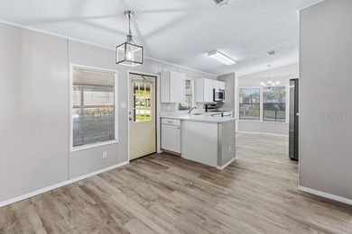 This newly remodeled manufactured home is located in the - photo 9
