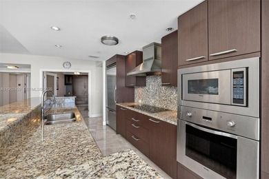 Experience refined coastal living in this premier