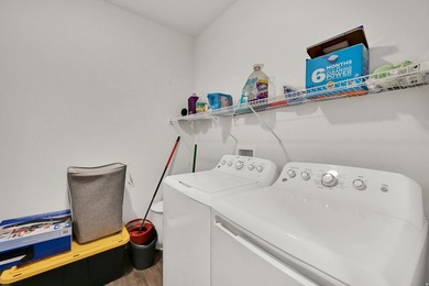 Nearly new and better than waiting for new construction! This - photo 18