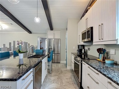Nestled near the end of a cul-de-sac, this beautifully remodeled - photo 10