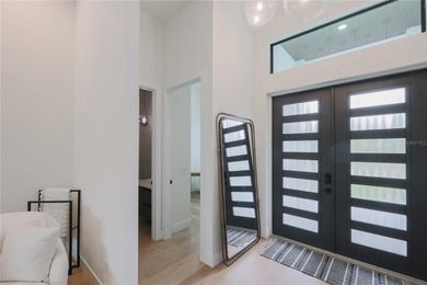 Welcome to a stunning 2024- custom built waterfront estate where - photo 5