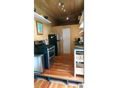 Charming tiny home nestled near picturesque Kentucky Lake! This - photo 3