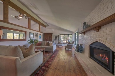 Nestled on a beautifully landscaped half-acre lot in one of - photo 11