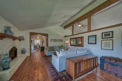 Nestled on a beautifully landscaped half-acre lot in one of - photo 12