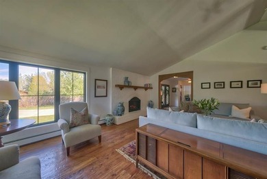 Nestled on a beautifully landscaped half-acre lot in one of - photo 13