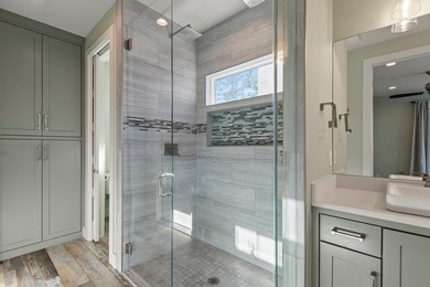 Approximately 295 feet of prime shoreline on a rare point lot