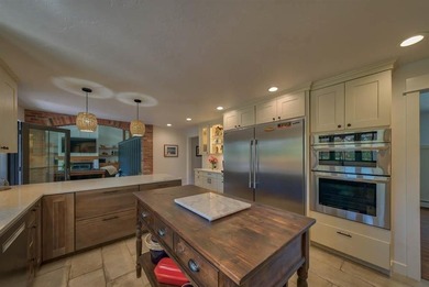Nestled on a beautifully landscaped half-acre lot in one of - photo 17