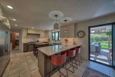 Nestled on a beautifully landscaped half-acre lot in one of - photo 20