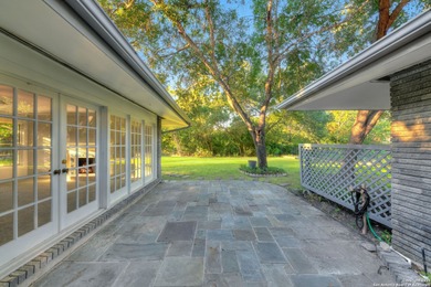 Step through the Terrazzo tile entry and discover a home where