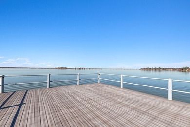 Approximately 295 feet of prime shoreline on a rare point lot