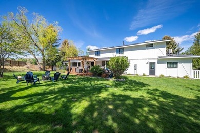 Nestled on a beautifully landscaped half-acre lot in one of - photo 34