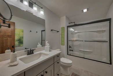 Nestled on a beautifully landscaped half-acre lot in one of - photo 41