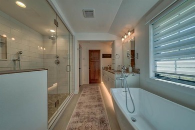 Nestled on a beautifully landscaped half-acre lot in one of - photo 49