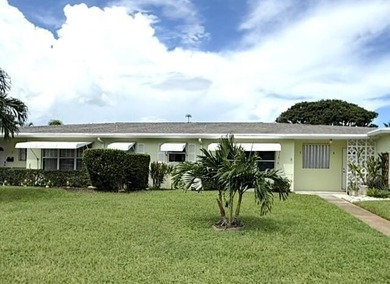 Welcome to this charming villa-style 1 bedroom, 1.5 bath condo - photo 1