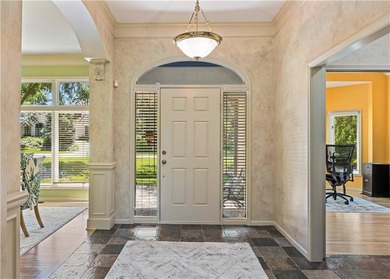 RARE FIND! Charming villa-styled home offers GATED SECURITY, a - photo 3