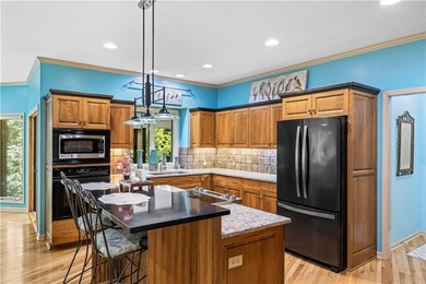 RARE FIND! Charming villa-styled home offers GATED SECURITY, a - photo 4