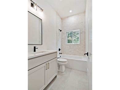 Stunning new construction home on a beautiful wooded lot! Just - photo 13